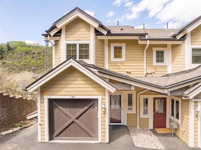 101 Lions Ln, Minturn, CO 81645 - view of front of property with roof with shingles and a garage