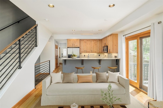 101 Lions Ln, Minturn, CO 81645 - living room with light wood-style floors, recessed lighting, and stairs