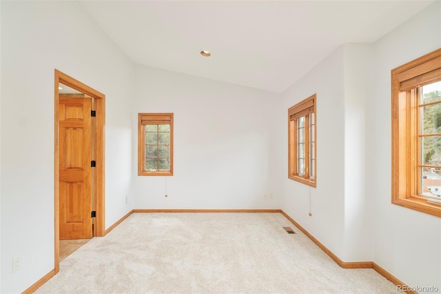 101 Lions Ln, Minturn, CO 81645 - unfurnished room with light colored carpet, baseboards, vaulted ceiling, and recessed lighting