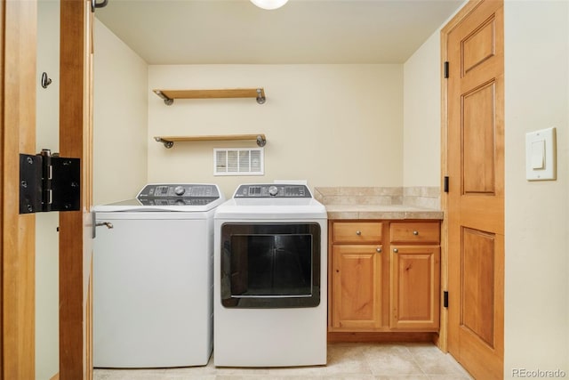101 Lions Ln, Minturn, CO 81645 - laundry room with washer and dryer and cabinet space
