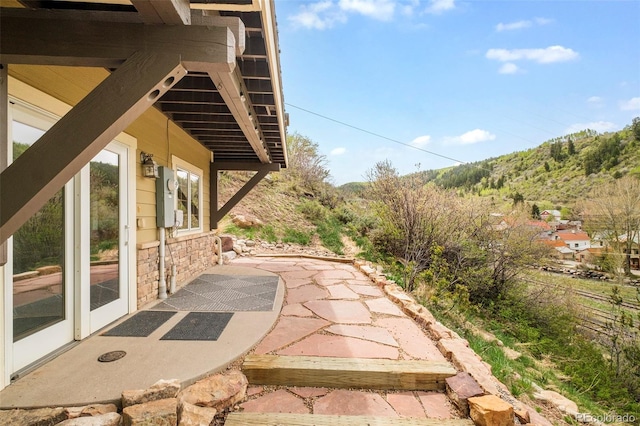 101 Lions Ln, Minturn, CO 81645 - view of patio / terrace with a mountain view