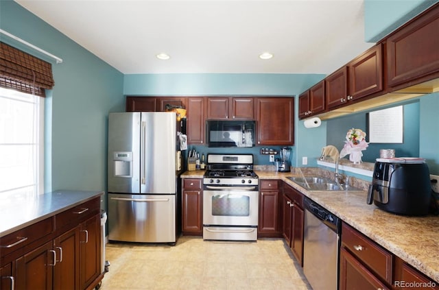 kitchen featuring sink and appliances with stainless steel finishes