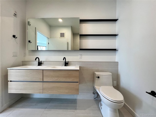 1601 Park Ave Unit 201, Denver, CO 80218 - bathroom with double vanity and tile patterned floors