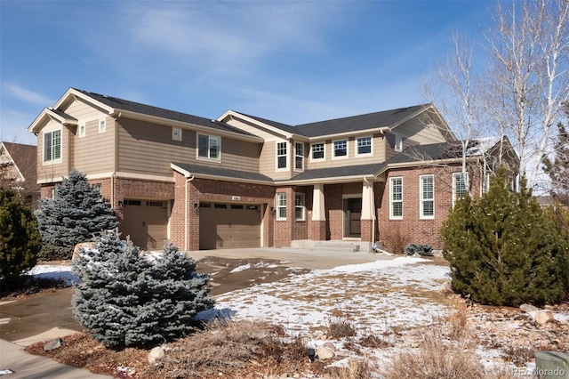 craftsman inspired home with a garage