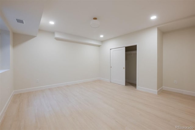 interior space featuring light hardwood / wood-style floors and a closet