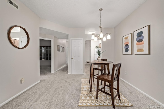 7481 Singing Hills Dr, Boulder, CO 80301 - dining space with light carpet, a chandelier, and baseboards