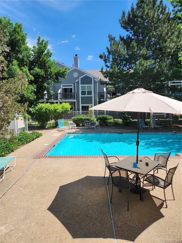 7481 Singing Hills Dr, Boulder, CO 80301 - community pool featuring a patio