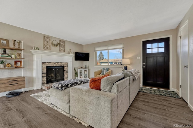 280 Jupiter Dr, Lone Tree, CO 80124 - living area with wood finished floors, baseboards, and a fireplace