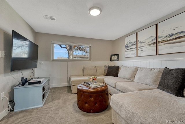 280 Jupiter Dr, Lone Tree, CO 80124 - living area featuring wainscoting, carpet flooring, and baseboards