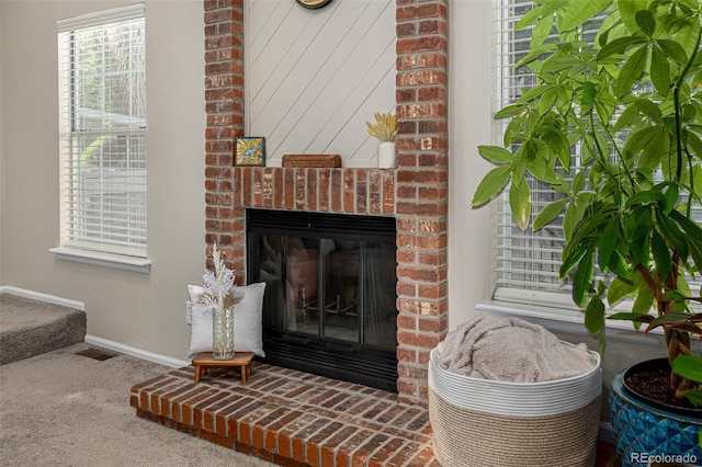 7684 S Monaco Cir, Centennial, CO 80112 - detailed view of carpet floors and a brick fireplace
