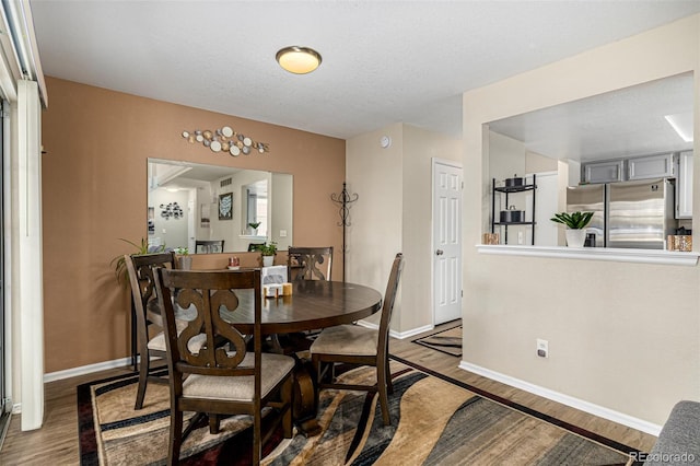 7684 S Monaco Cir, Centennial, CO 80112 - dining area featuring wood finished floors and baseboards