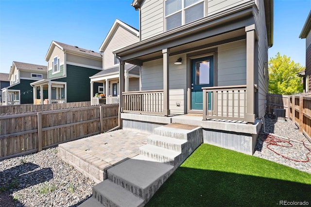 12777 Ulster St, Thornton, CO 80602 - property entrance with covered porch