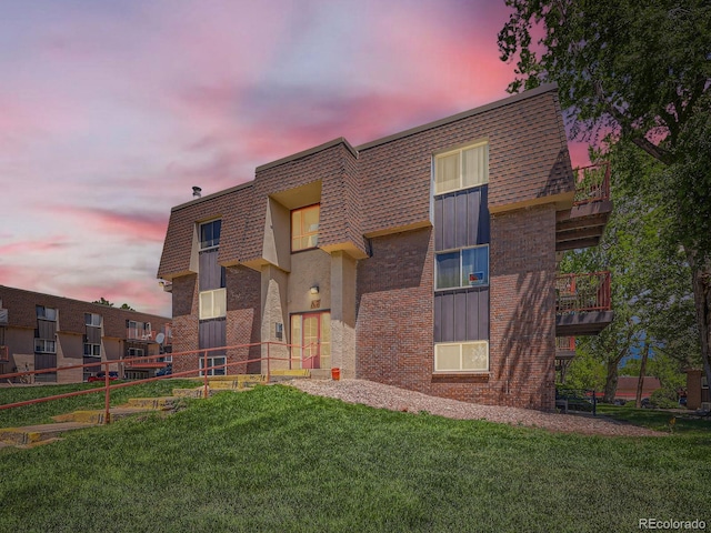 7755 E Quincy Ave Unit 301A7, Denver, CO 80237 - view of front of home with mansard roof and brick siding