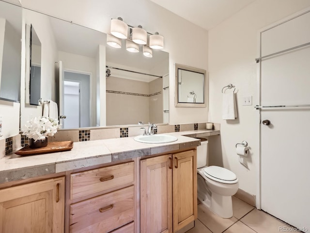 7755 E Quincy Ave Unit 301A7, Denver, CO 80237 - full bath with toilet, tile patterned floors, a shower, and vanity