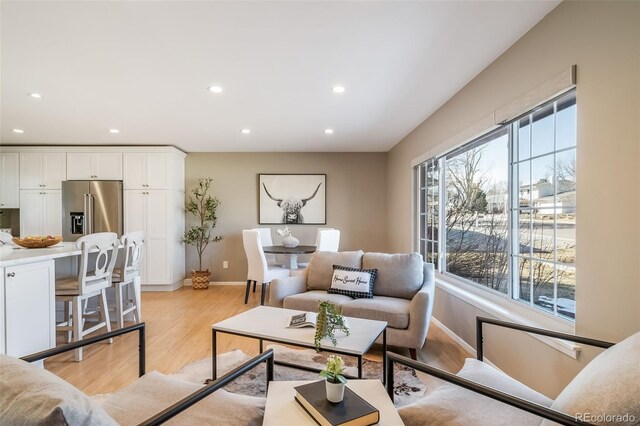 5404 W Rowland Pl, Littleton, CO 80128 - living room featuring recessed lighting and light wood-type flooring