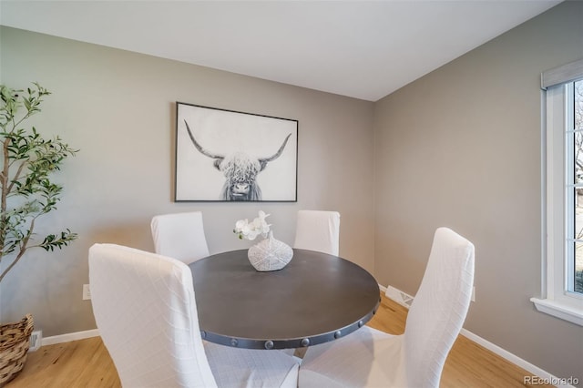 5404 W Rowland Pl, Littleton, CO 80128 - dining area with wood finished floors and baseboards