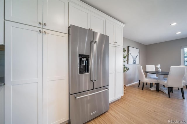 5404 W Rowland Pl, Littleton, CO 80128 - kitchen featuring high end refrigerator, light wood-style floors, white cabinetry, and recessed lighting