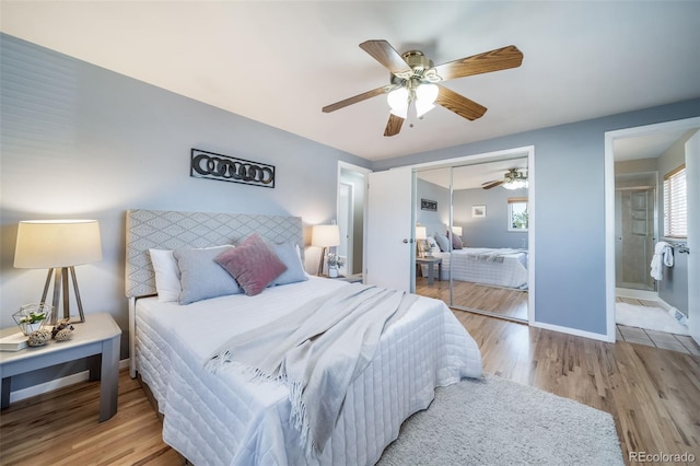 5404 W Rowland Pl, Littleton, CO 80128 - bedroom featuring wood finished floors, a closet, ceiling fan, and ensuite bathroom