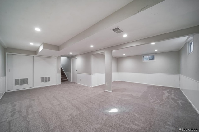 5404 W Rowland Pl, Littleton, CO 80128 - basement featuring carpet flooring, recessed lighting, and stairs