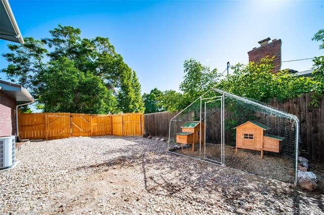 5404 W Rowland Pl, Littleton, CO 80128 - view of yard with exterior structure and an outbuilding