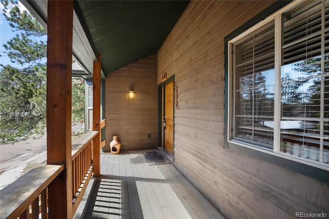 deck with covered porch
