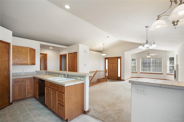 kitchen with dishwasher, a peninsula, lofted ceiling, a chandelier, and a sink