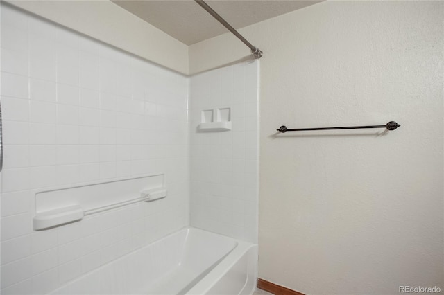 bathroom featuring baseboards