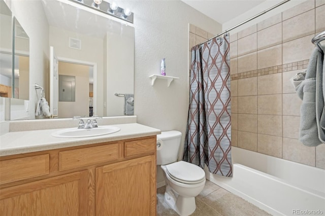 full bathroom with tile patterned floors, toilet, shower / bathtub combination with curtain, and vanity