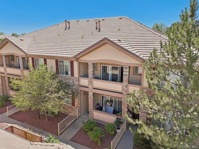 view of front of home with a balcony