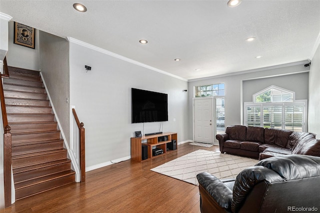 5326 E Hamilton Ave, Castle Rock, CO 80104 - living area featuring stairs, wood finished floors, crown molding, and recessed lighting