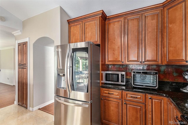 5326 E Hamilton Ave, Castle Rock, CO 80104 - kitchen featuring stainless steel appliances and brown cabinets