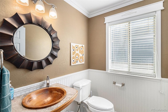 5326 E Hamilton Ave, Castle Rock, CO 80104 - bathroom featuring wainscoting and ornamental molding