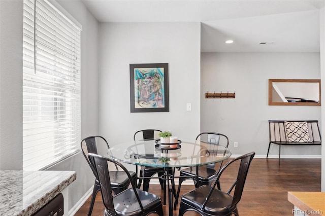 dining room with visible vents, baseboards, dark wood finished floors, and recessed lighting