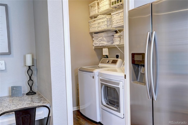 clothes washing area with laundry area and separate washer and dryer