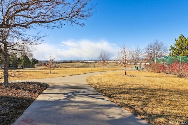 view of home's community featuring a yard