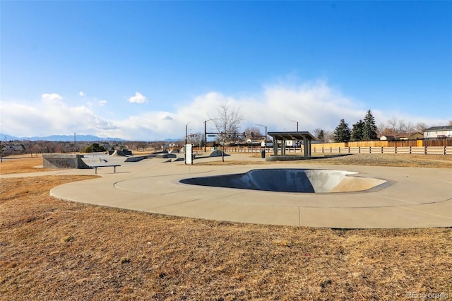 view of basketball court featuring a mountain view