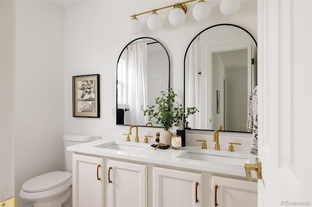 9756 Autumnwood Pl, Highlands Ranch, CO 80129 - full bathroom with double vanity and toilet