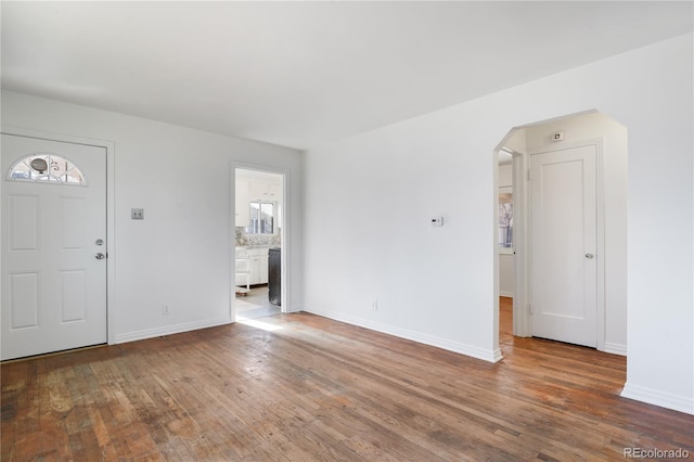 foyer entrance with hardwood / wood-style floors