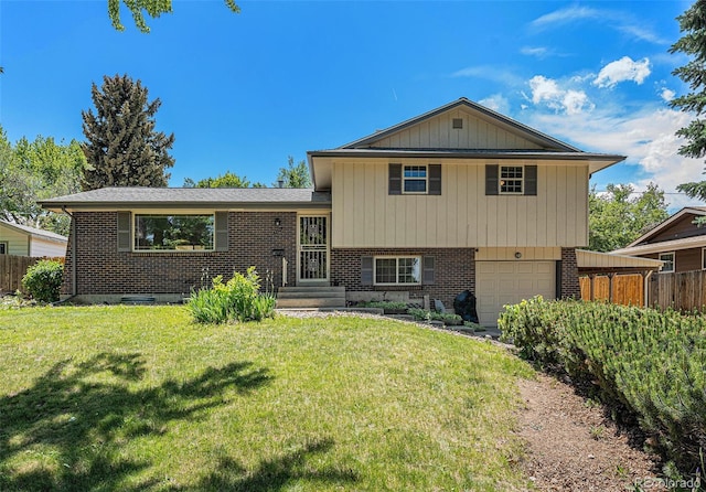 8346 W Woodard Dr, Lakewood, CO 80227 - split level home featuring brick siding and a garage