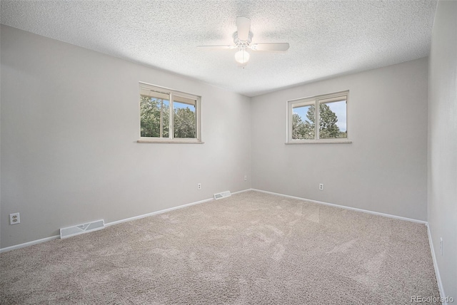 8346 W Woodard Dr, Lakewood, CO 80227 - carpeted empty room with a ceiling fan, a textured ceiling, and baseboards