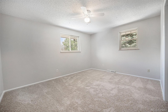 8346 W Woodard Dr, Lakewood, CO 80227 - carpeted empty room featuring ceiling fan, baseboards, and a textured ceiling