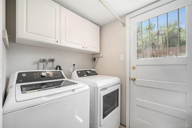 8346 W Woodard Dr, Lakewood, CO 80227 - washroom featuring washing machine and clothes dryer and cabinet space