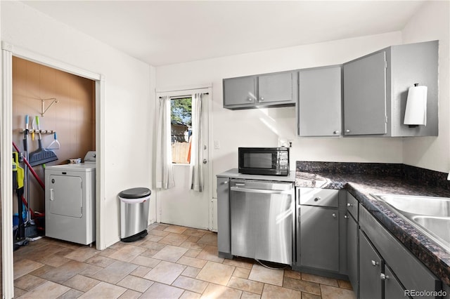 kitchen with gray cabinets, sink, and stainless steel dishwasher