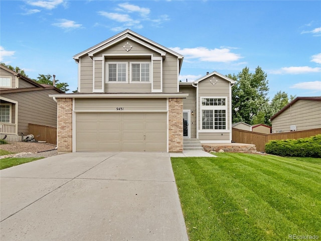 view of front facade featuring a garage and a front yard