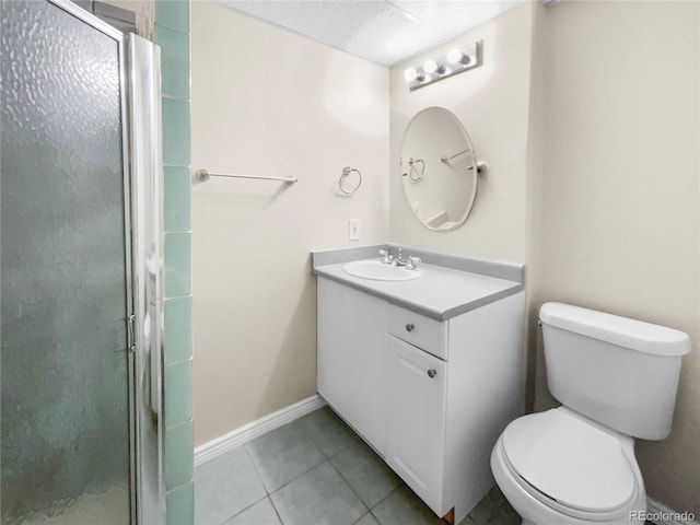 bathroom with walk in shower, vanity, toilet, and tile patterned flooring