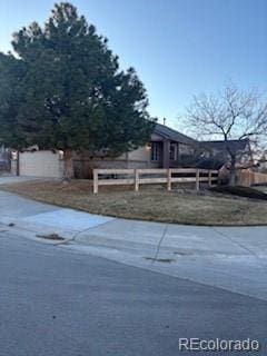 view of front of property with fence