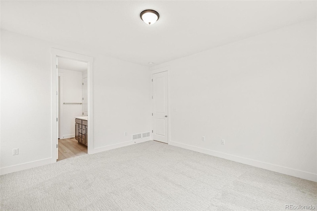 20665 E 57th Dr, Aurora, CO 80019 - unfurnished room featuring light carpet and baseboards