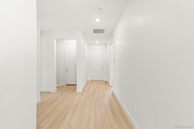 20665 E 57th Dr, Aurora, CO 80019 - hall with baseboards, light wood-style flooring, and recessed lighting