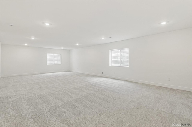 20665 E 57th Dr, Aurora, CO 80019 - unfurnished room with recessed lighting, light colored carpet, and baseboards