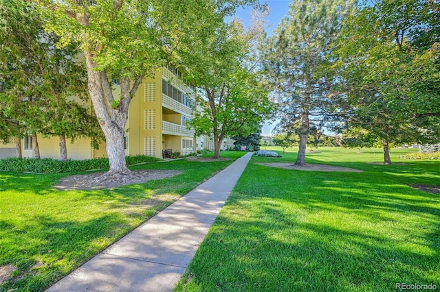 view of home's community featuring a lawn